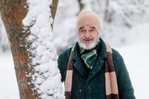 Hotel hotel Mazury portrait of elegant senior man standing by a tree 2024 10 18 09 48 01 utc